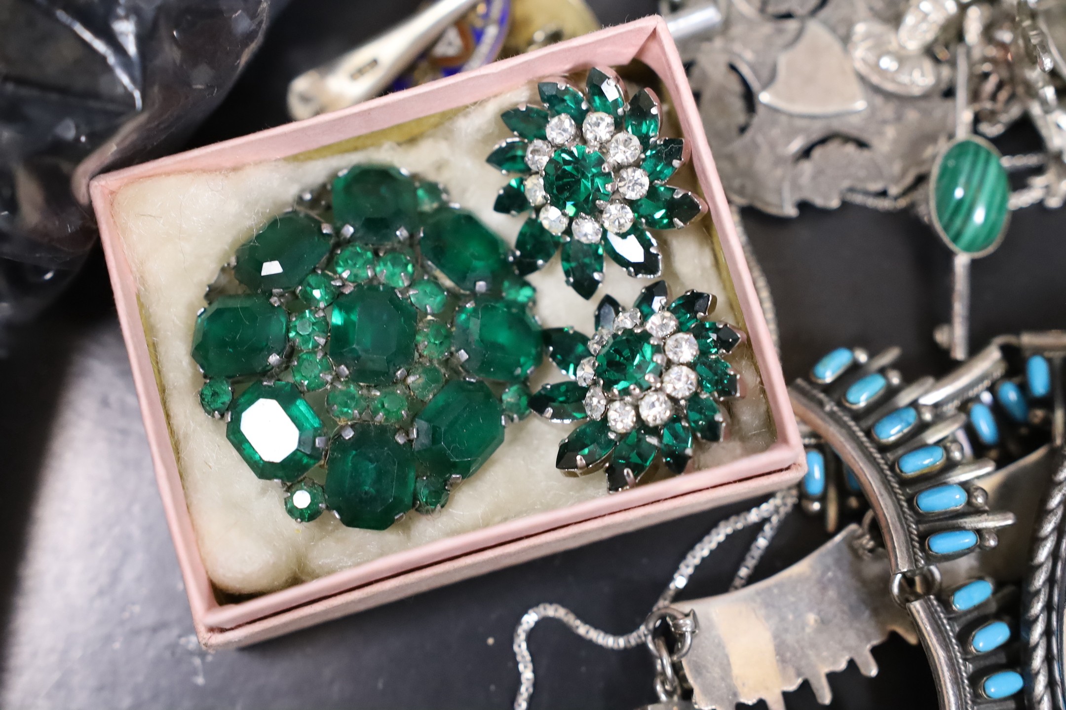 Mixed costume jewellery and other items including silver charm bracelet and silver and enamel baby brooch, Maundy money and a silver mounted dwarf candlestick.